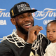 LeBron James of the Cleveland Cavaliers holds his daughter Zhuri during a press conference following the Cavs’ defeat of the Golden State Warriors 93-89 in Game 7 to win the 2016 NBA Finals June 19, 2016, in Oakland, Calif.
Thearon W. Henderson/Getty Images